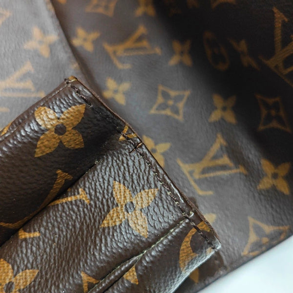 MÉTIS MM Monogram Coated Canvas Brown