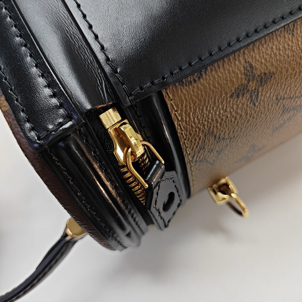 CANNES PM Monogram Coated Canvas Brown