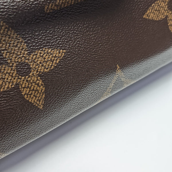 ONTHEGO MM Monogram Coated Canvas Brown