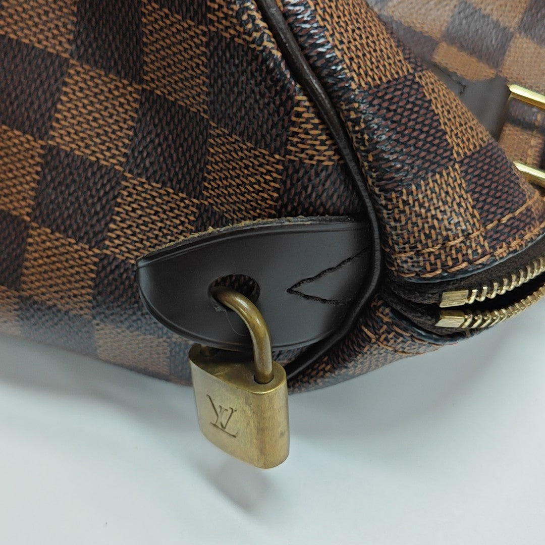 SPEEDY 25 Damier Ebene Coated Canvas Brown