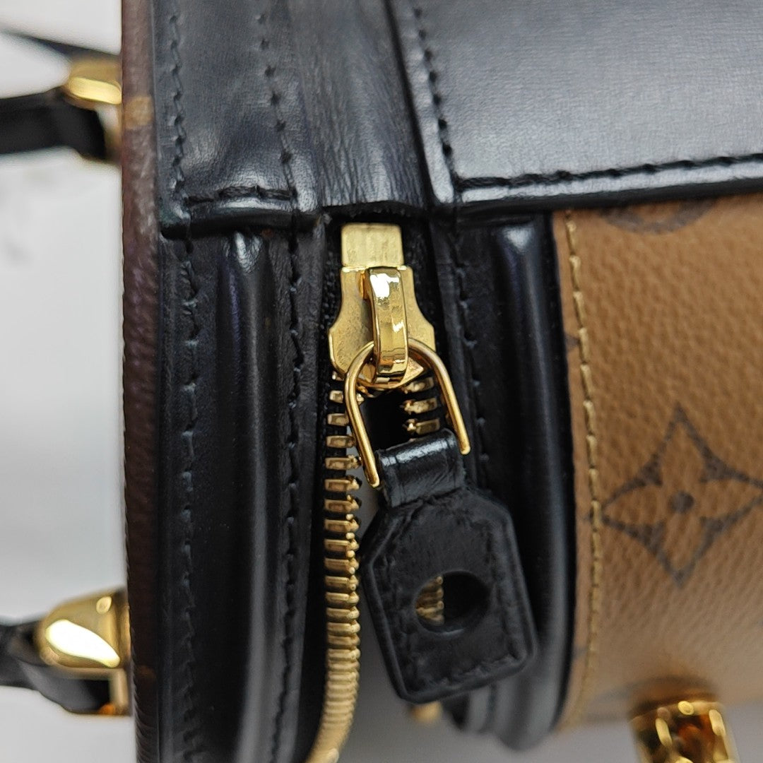 CANNES PM Monogram Coated Canvas Brown