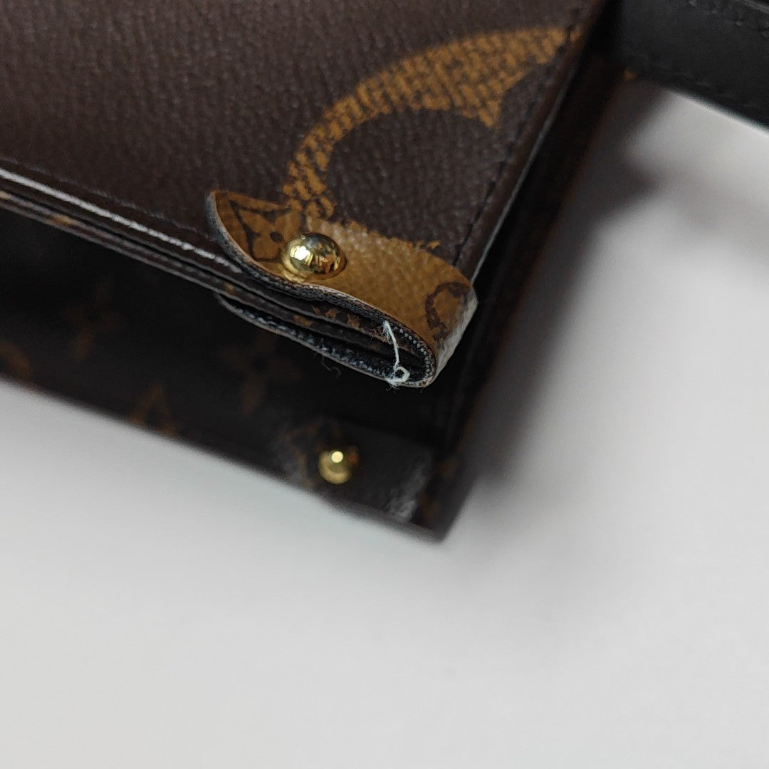 ONTHEGO MM Monogram Coated Canvas Brown