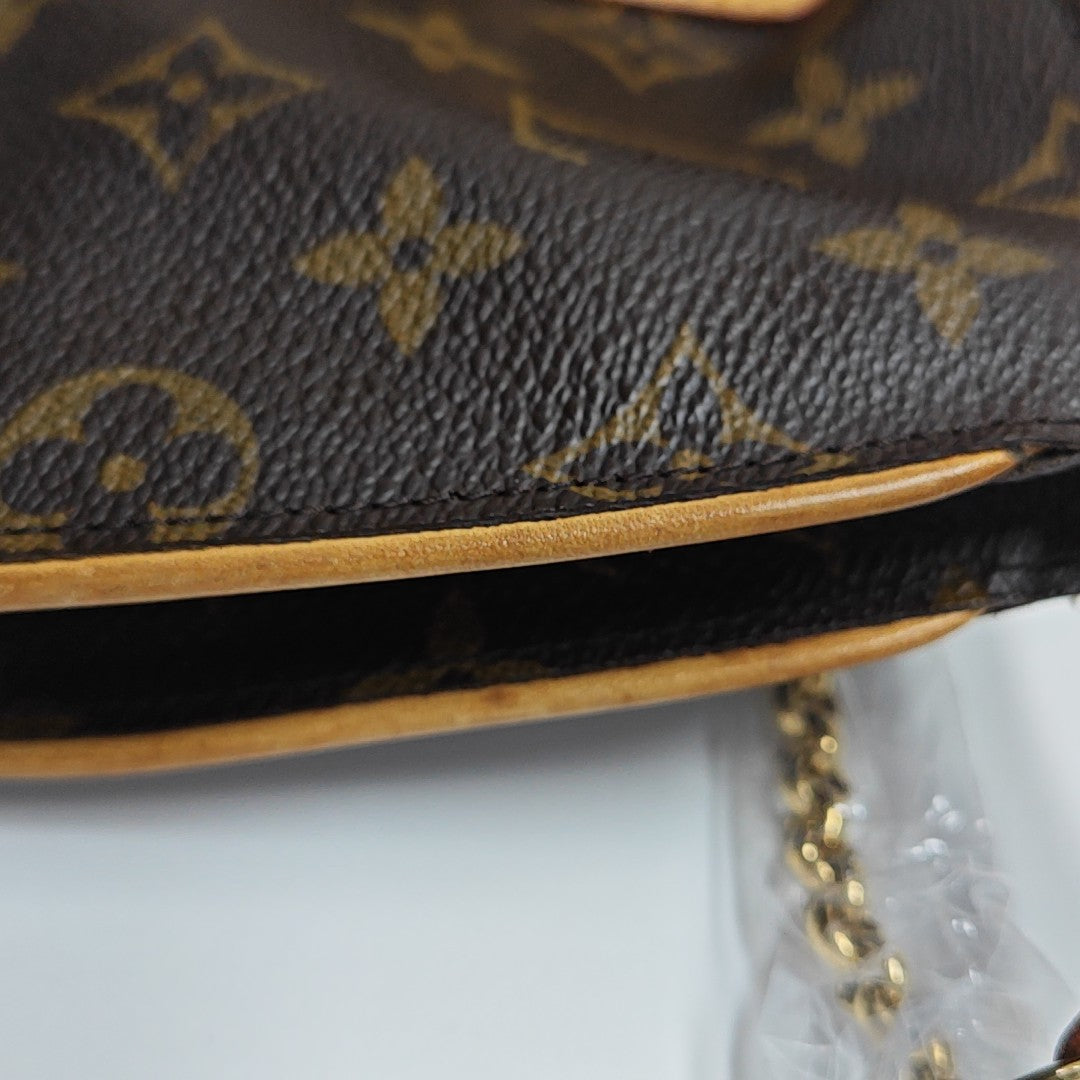 EVA Monogram Coated Canvas Brown