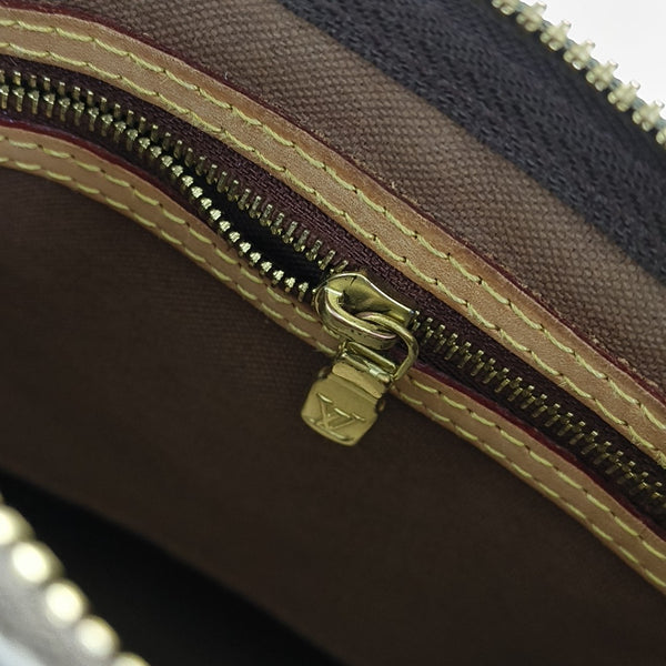 SPEEDY 25 Monogram Coated Canvas Brown