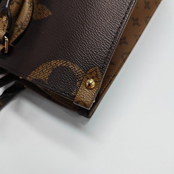 ONTHEGO MM Monogram Coated Canvas Brown