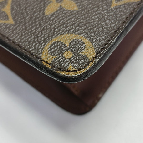 Monogram Coated Canvas Clutch Brown