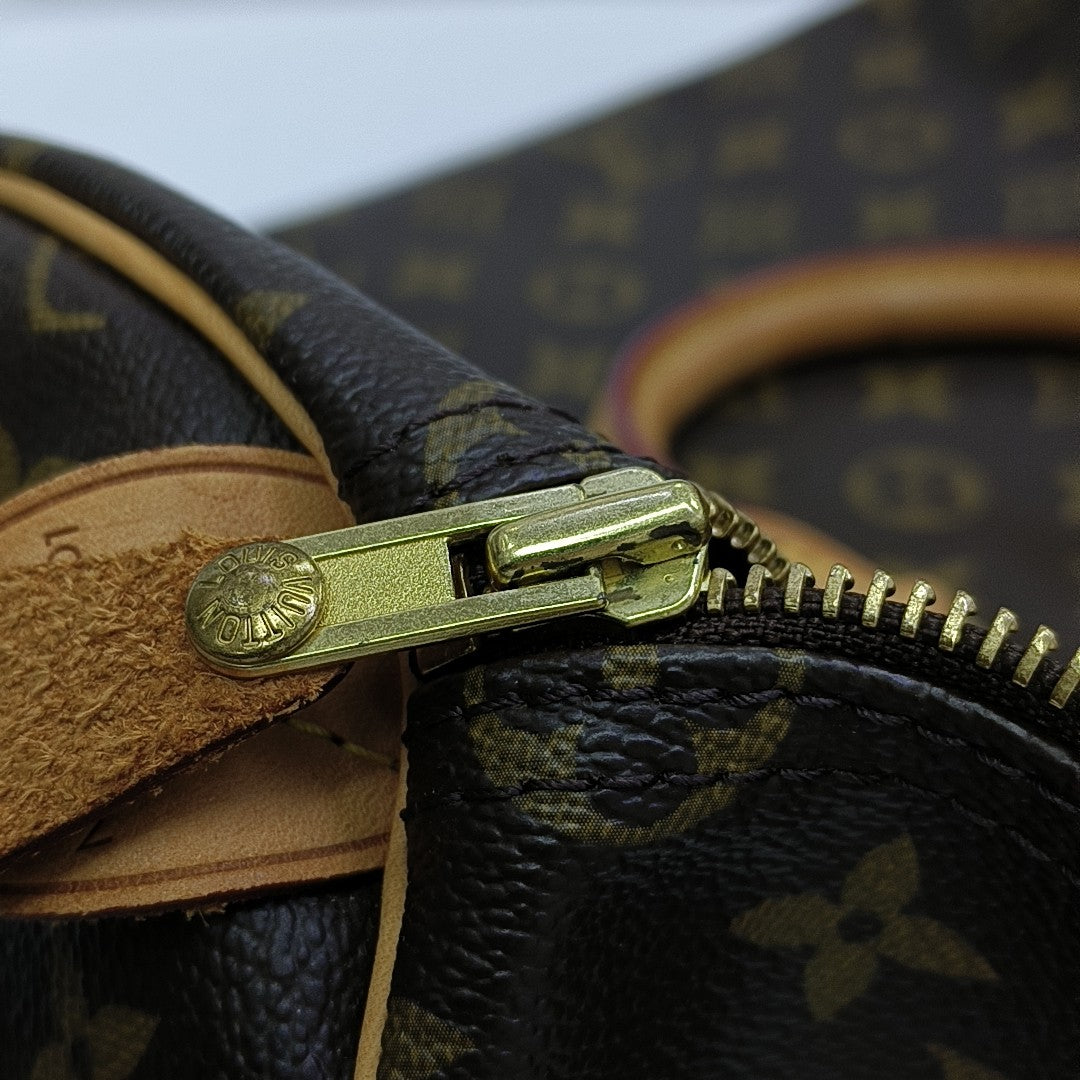SPEEDY 35 Monogram Coated Canvas Brown