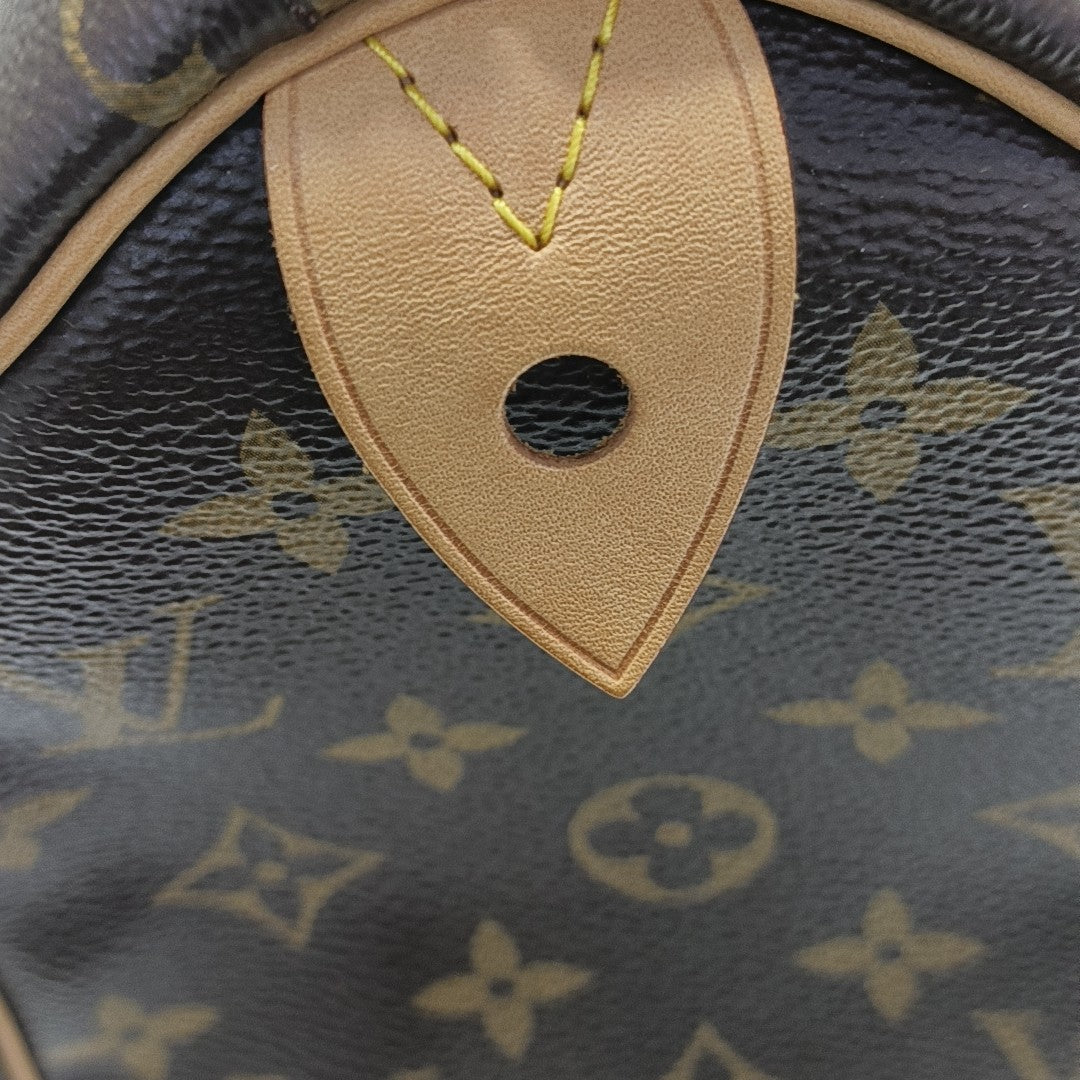SPEEDY 25 Monogram Coated Canvas Brown