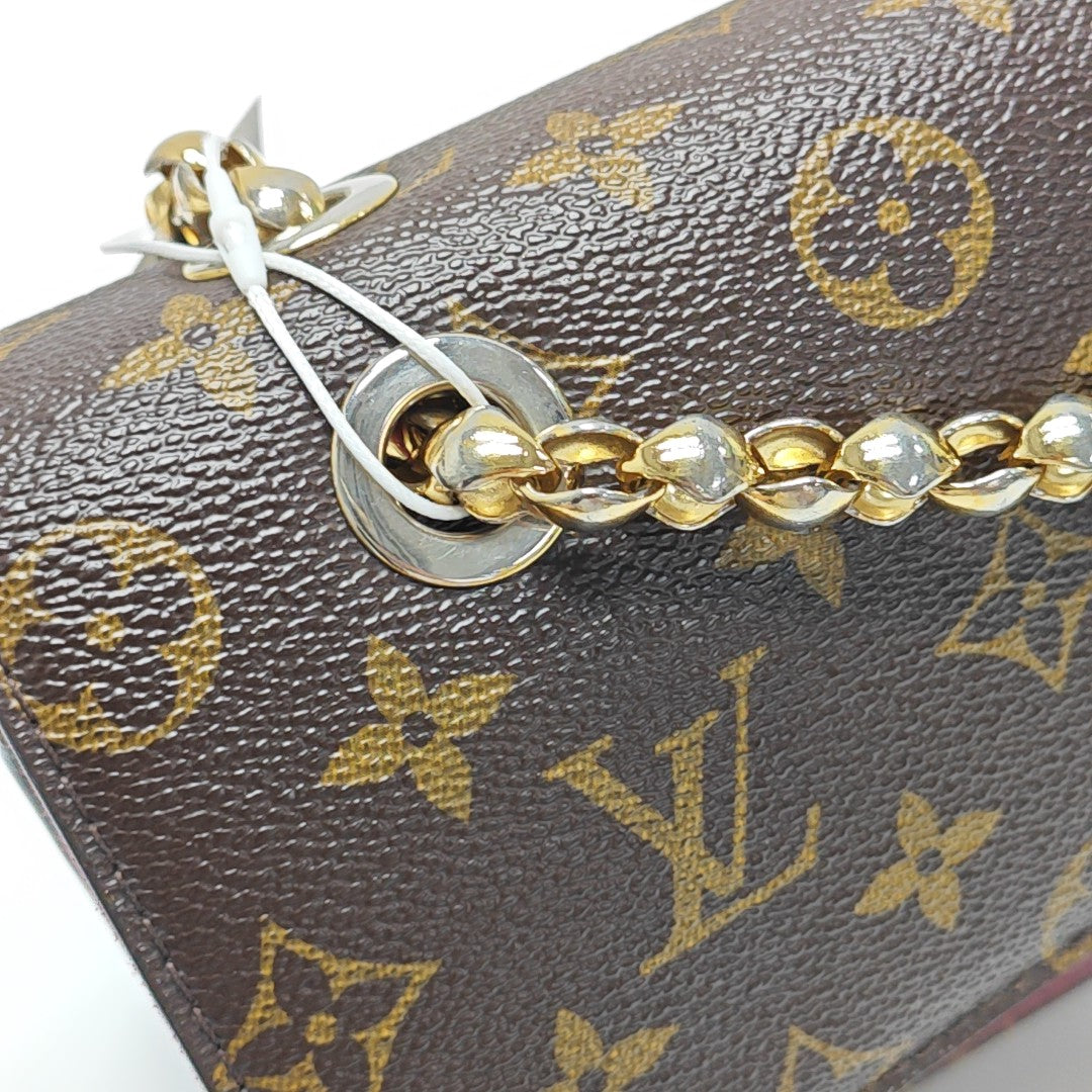 VICTOIRE Monogram Coated Canvas Brown