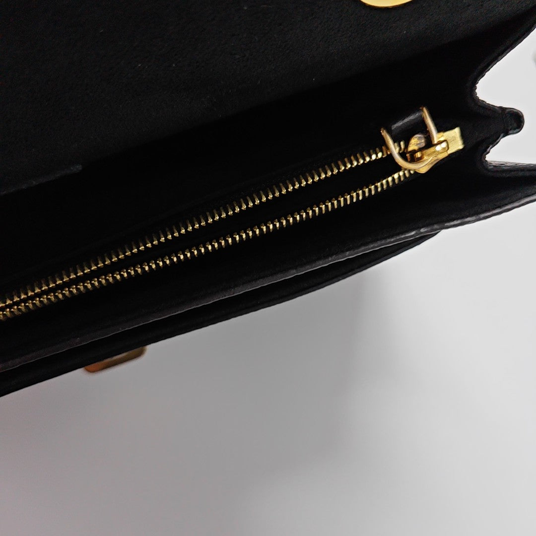 VICTOIRE Monogram Coated Canvas Brown