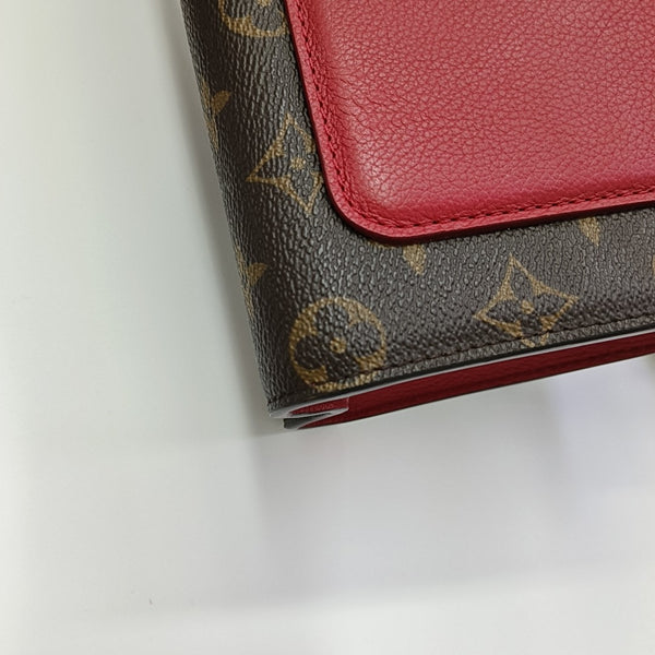 VICTOIRE Monogram Coated Canvas Brown