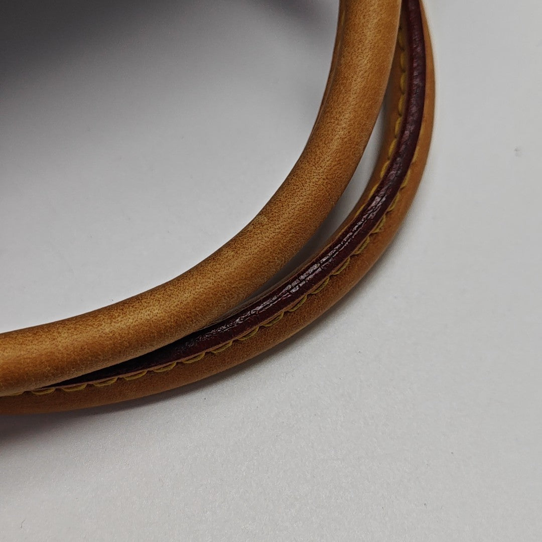 MONTAIGNE Monogram Coated Canvas Brown