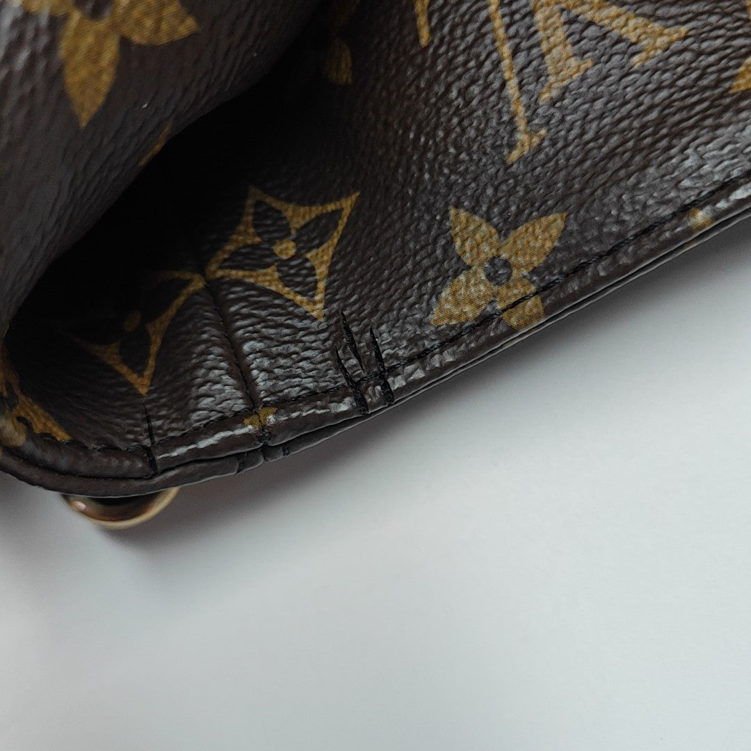 MELIE Monogram Coated Canvas Brown