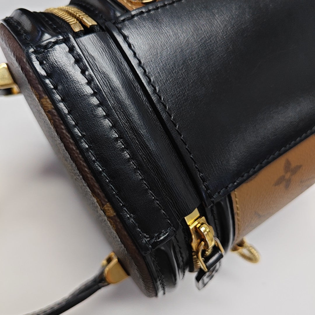 CANNES PM Monogram Coated Canvas Brown