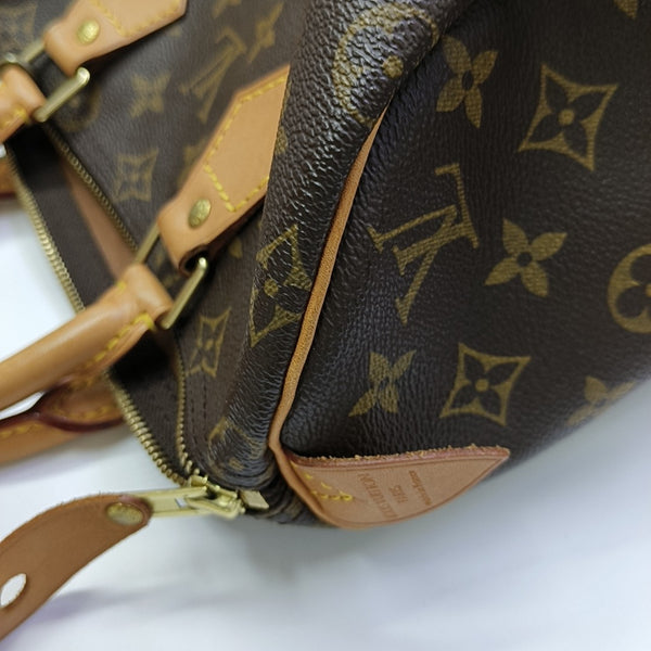 SPEEDY 25 Monogram Coated Canvas Brown