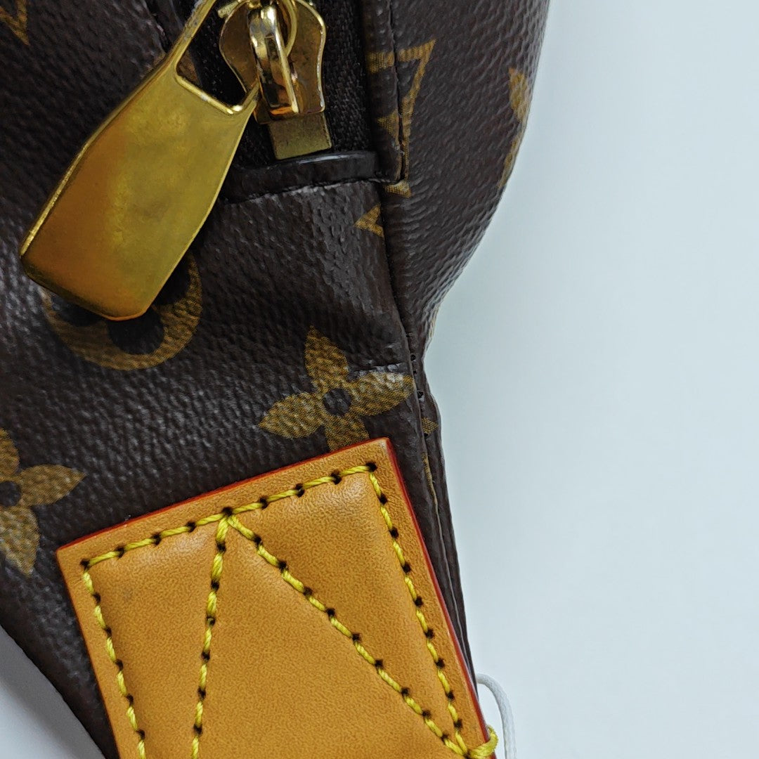 RUSH Monogram Coated Canvas Brown