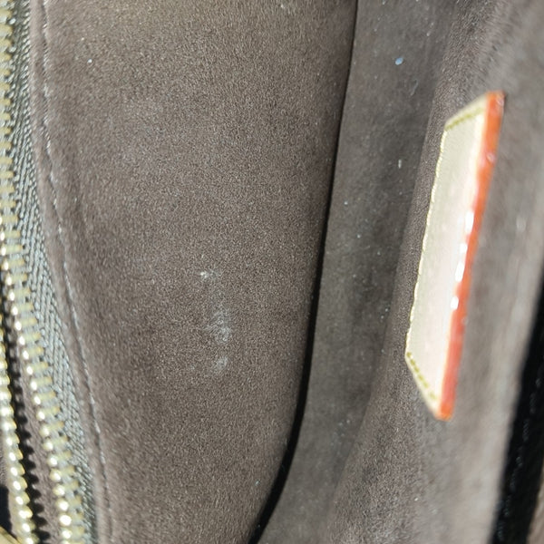 MÉTIS EAST WEST Monogram Coated Canvas Brown