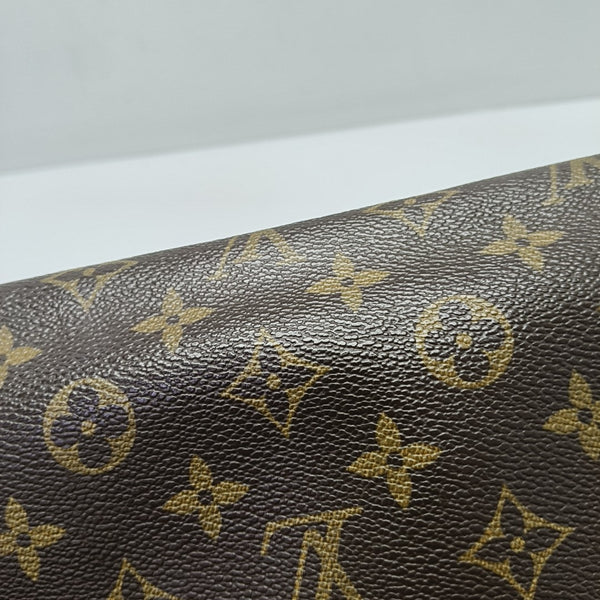 LOOPING PM Monogram Coated Canvas Brown