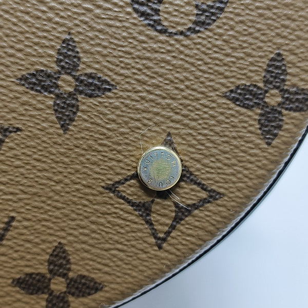 CANNES PM Monogram Coated Canvas Brown