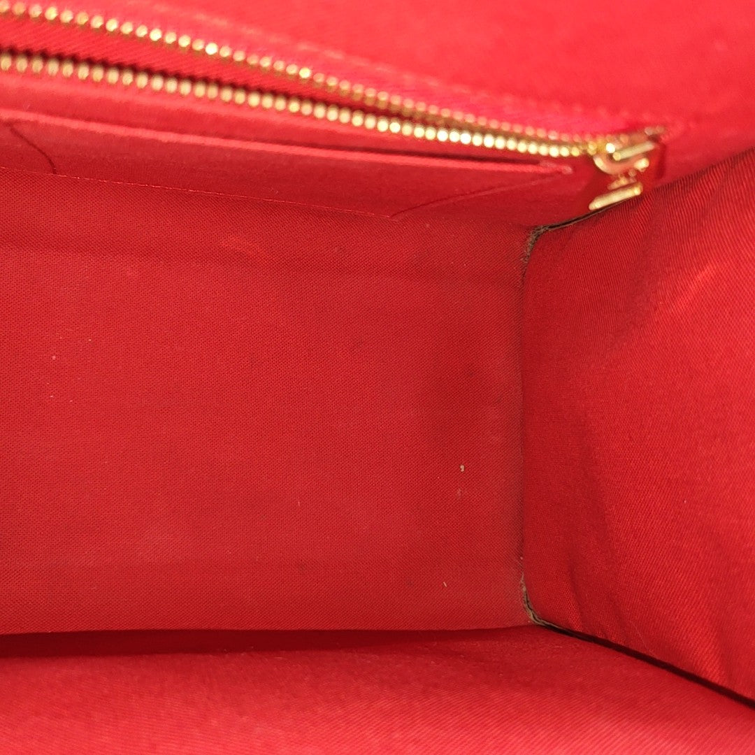 ONTHEGO MM Monogram Coated Canvas Brown