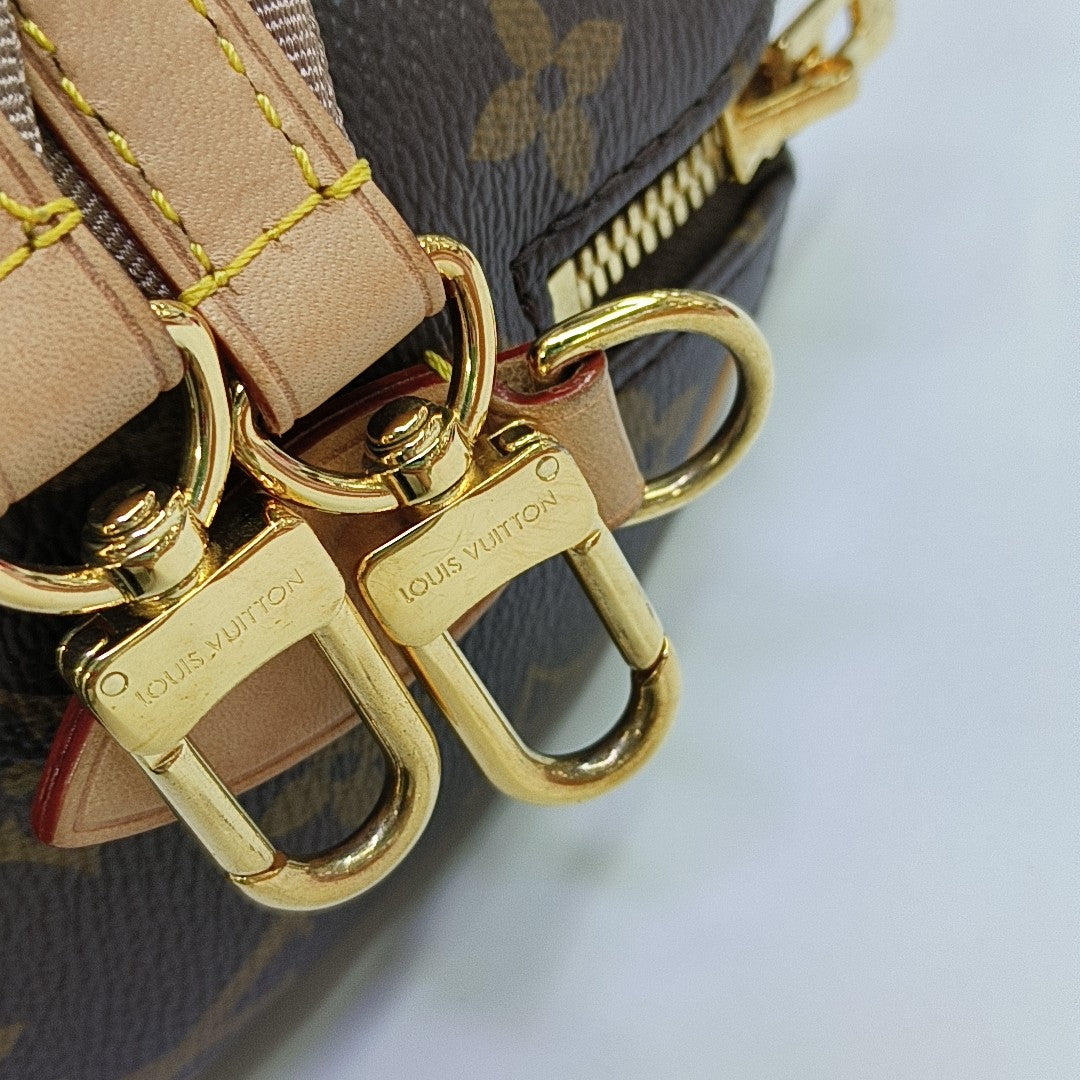 SPEEDY 20 Monogram Coated Canvas Brown
