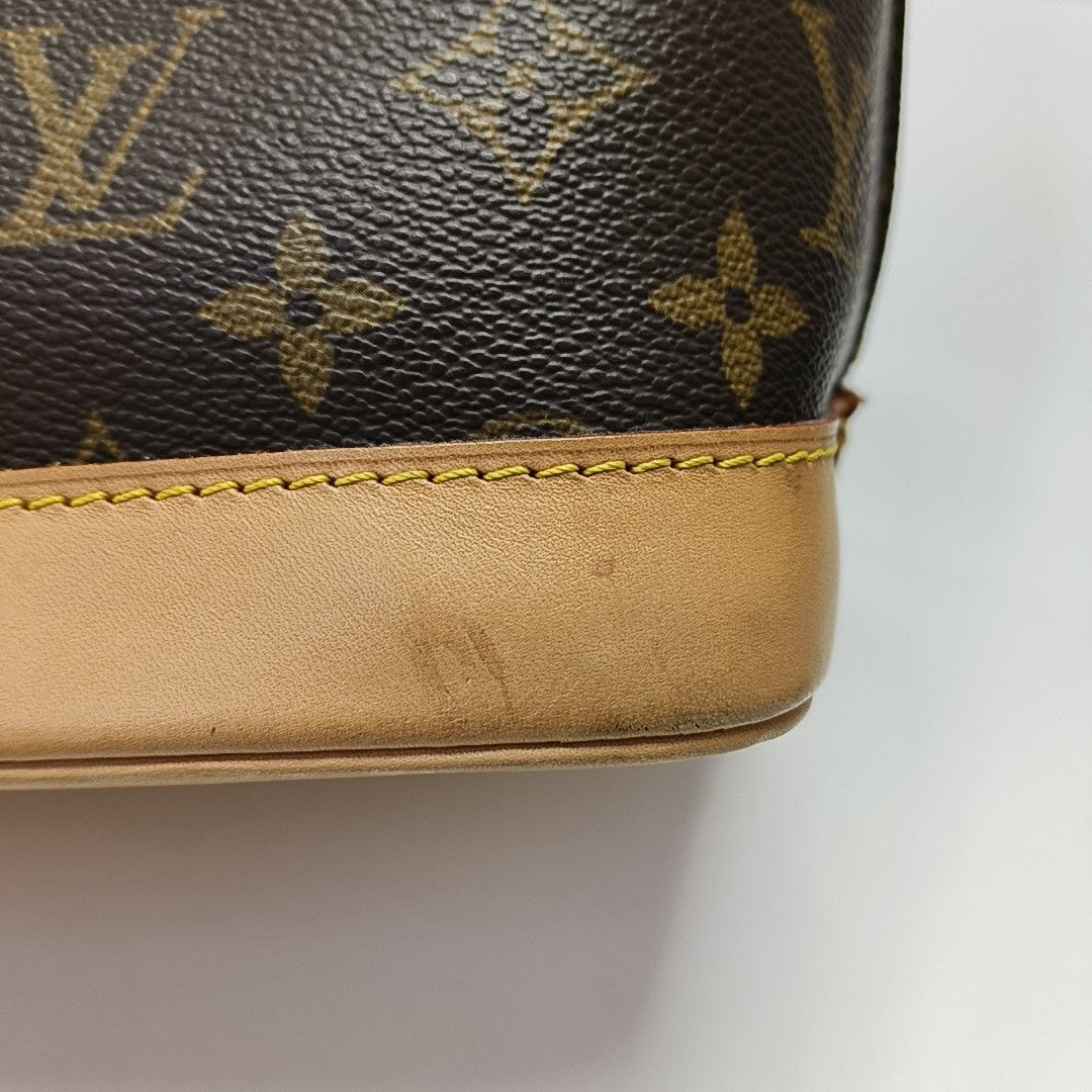 ALMA PM Monogram Coated Canvas Brown