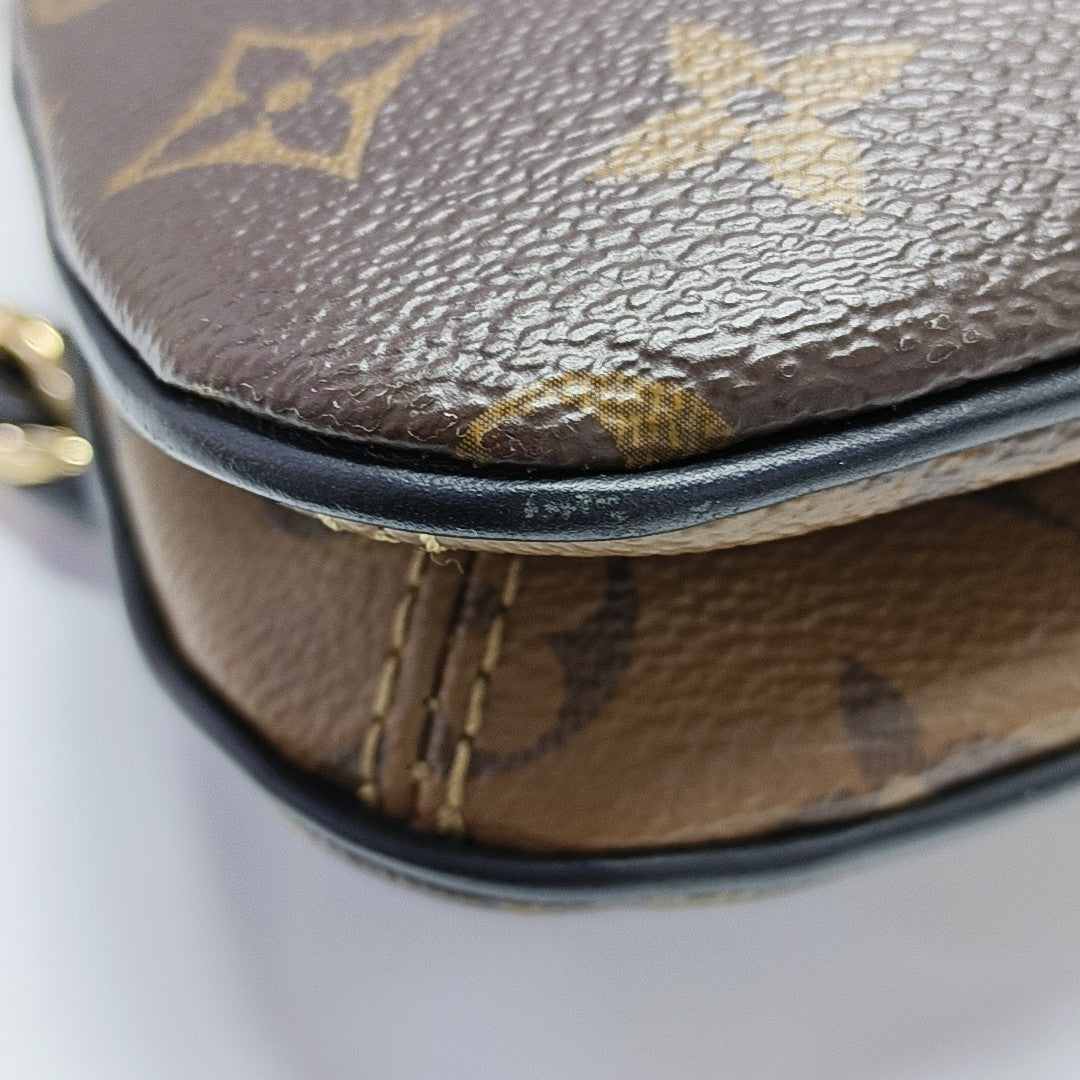 TWINNY Monogram Coated Canvas Brown