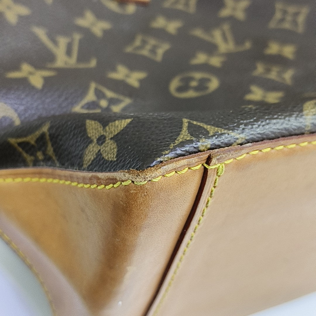 PIANO Monogram Coated Canvas Brown