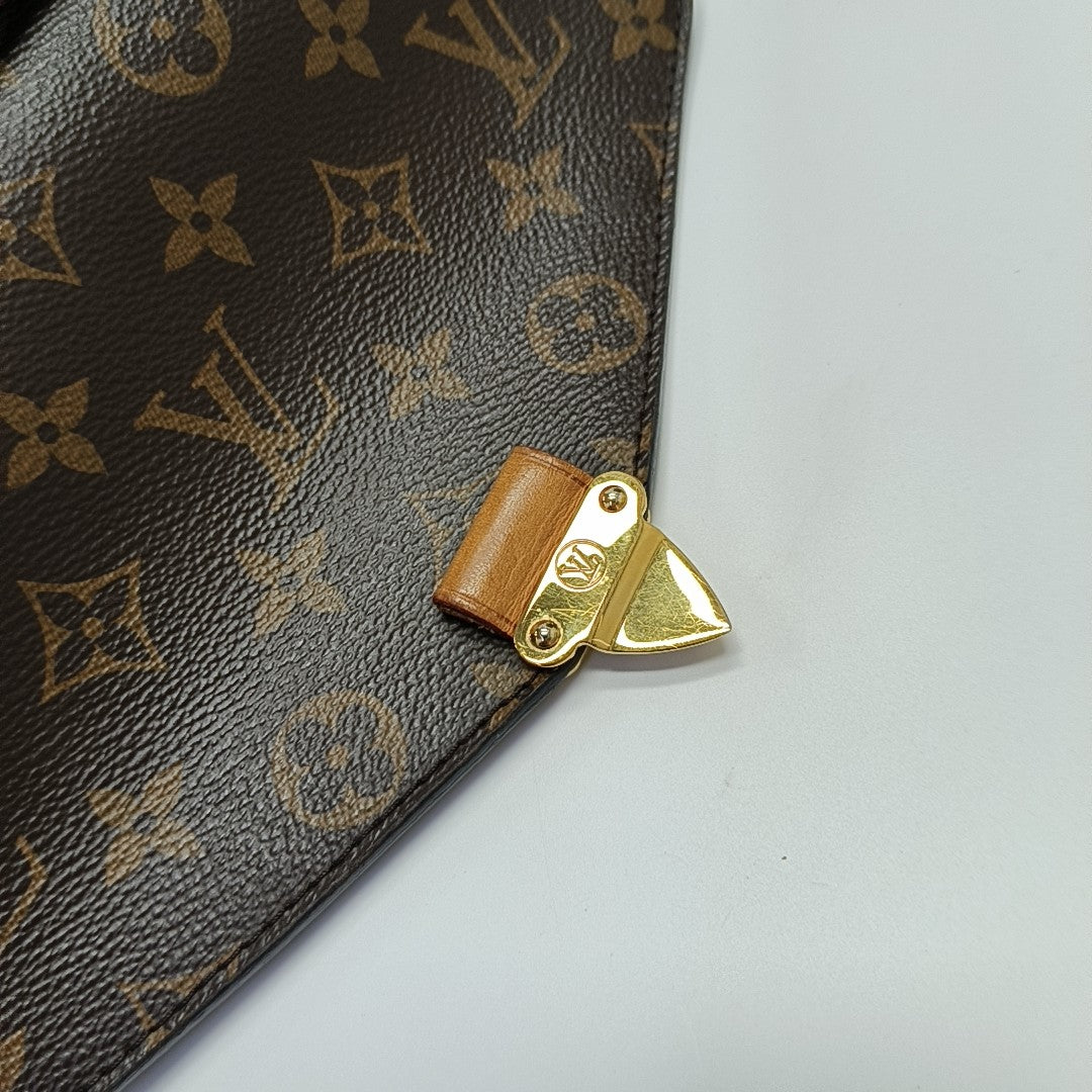 MÉTIS MM Monogram Coated Canvas Brown