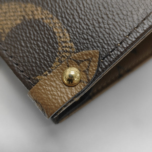 ONTHEGO MM Monogram Coated Canvas Brown