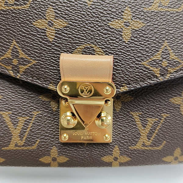 MÉTIS EAST WEST Monogram Coated Canvas Brown