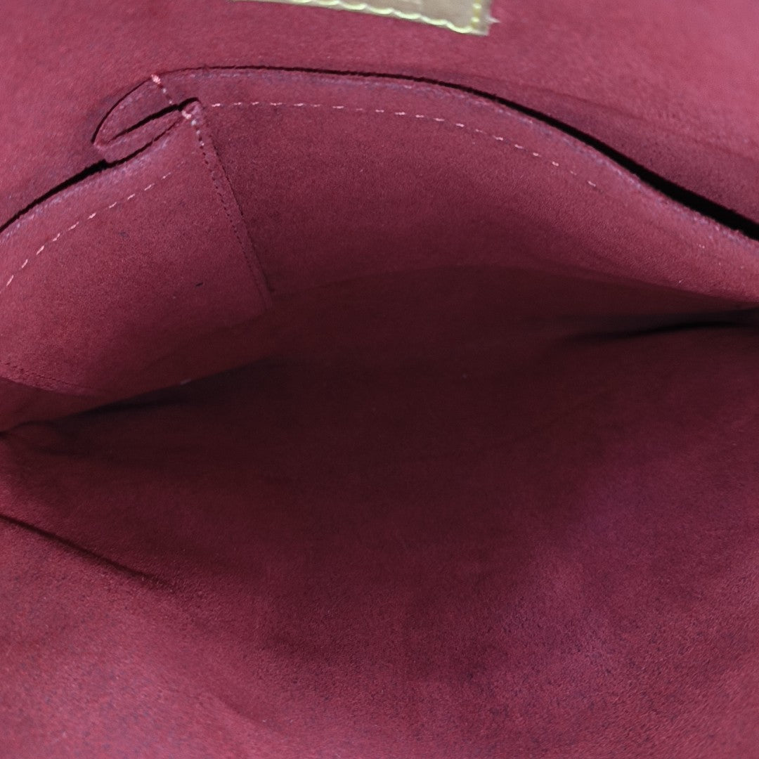 COUSSIN GM Monogram Coated Canvas Brown