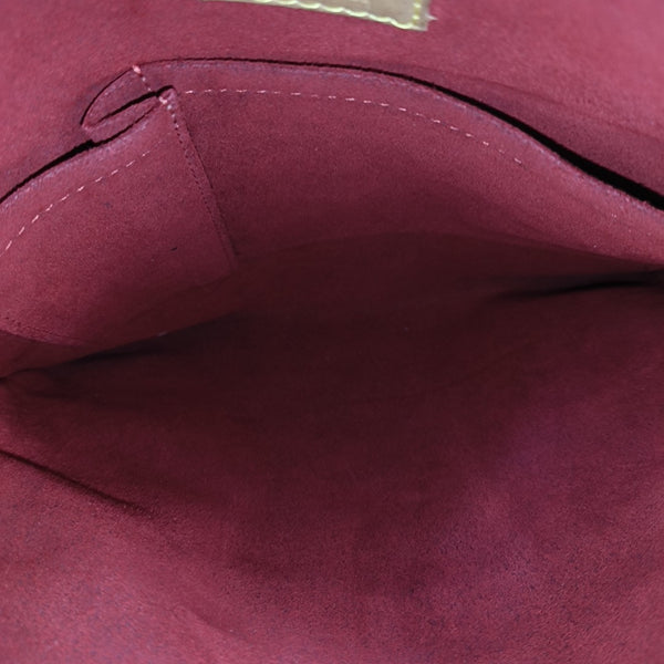 COUSSIN GM Monogram Coated Canvas Brown