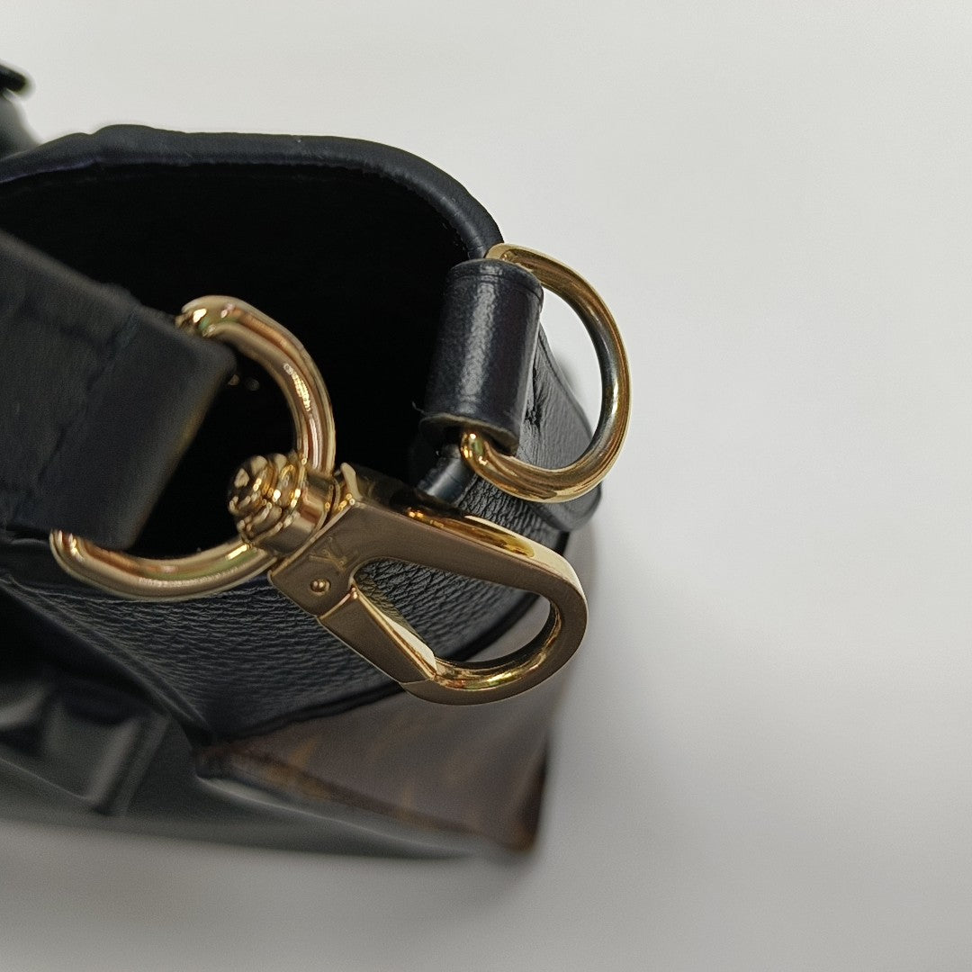 ON MY SIDE PM Monogram Coated Canvas Black