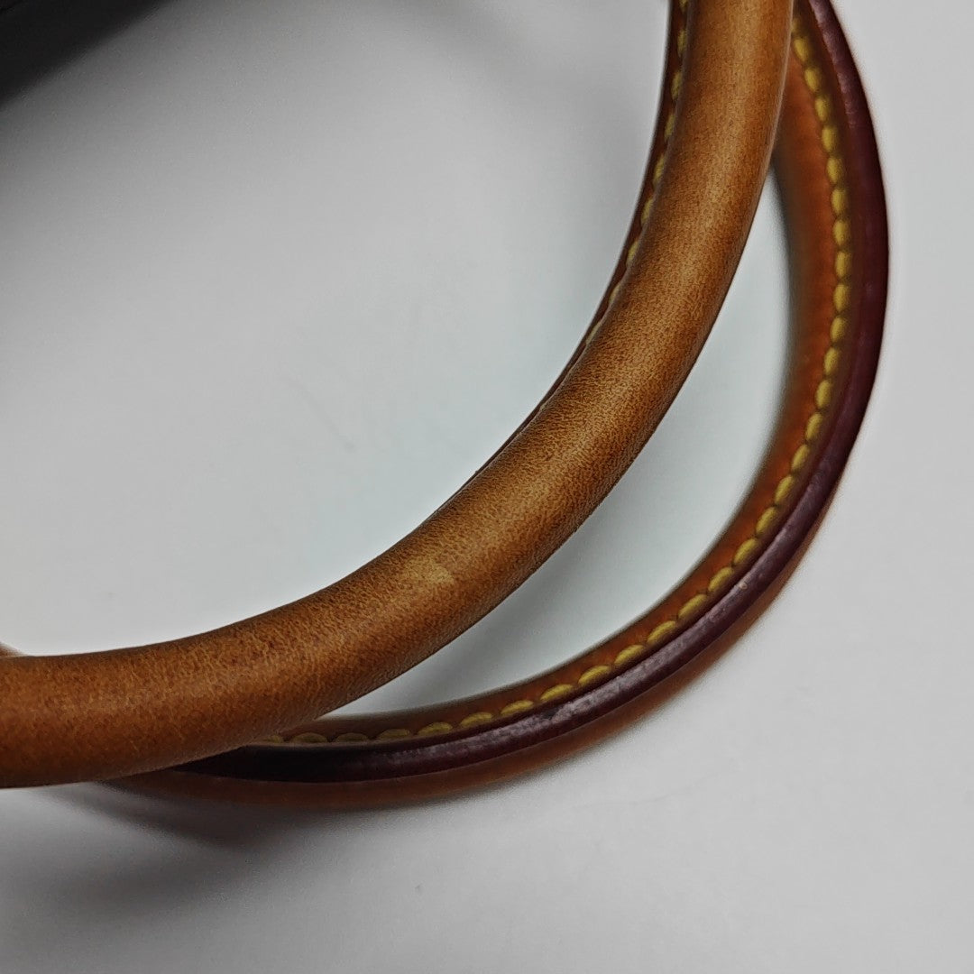 MONTAIGNE Monogram Coated Canvas Brown