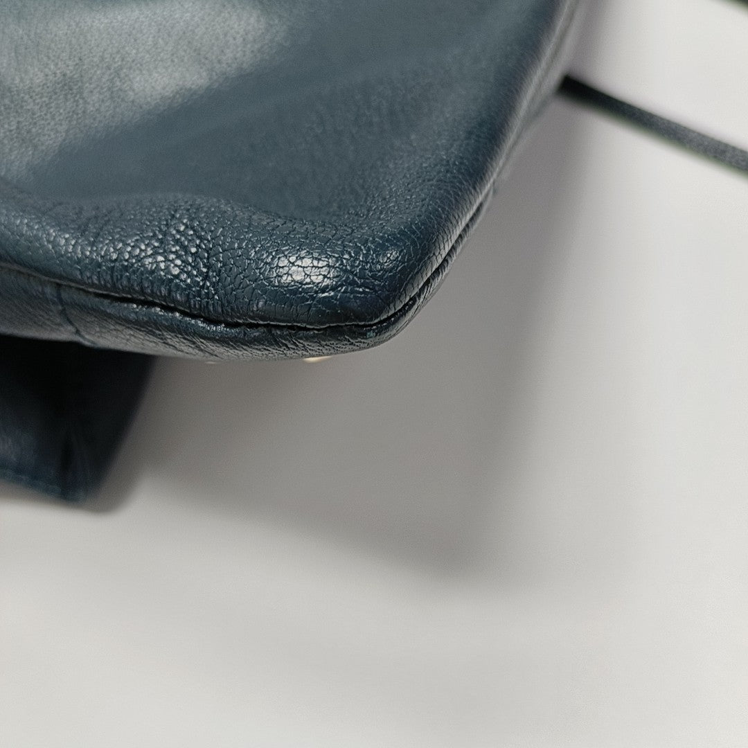 Authenticated pre-owned  Classic Metallic Edge City Calfskin Blue - Clutch at Looply