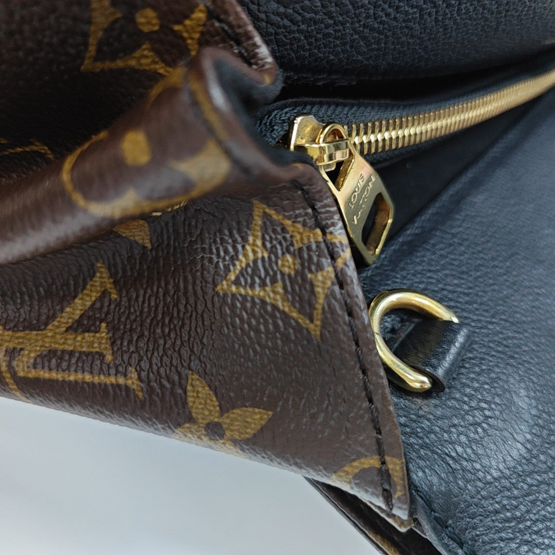 VÉNUS Monogram Coated Canvas Brown