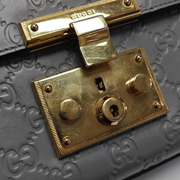 Padlock Small Monogram Calfskin Gray