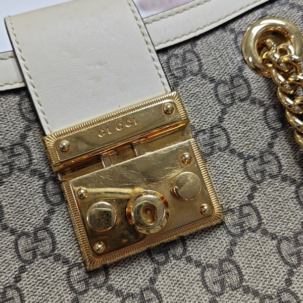 Padlock Small Monogram Coated Canvas Beige