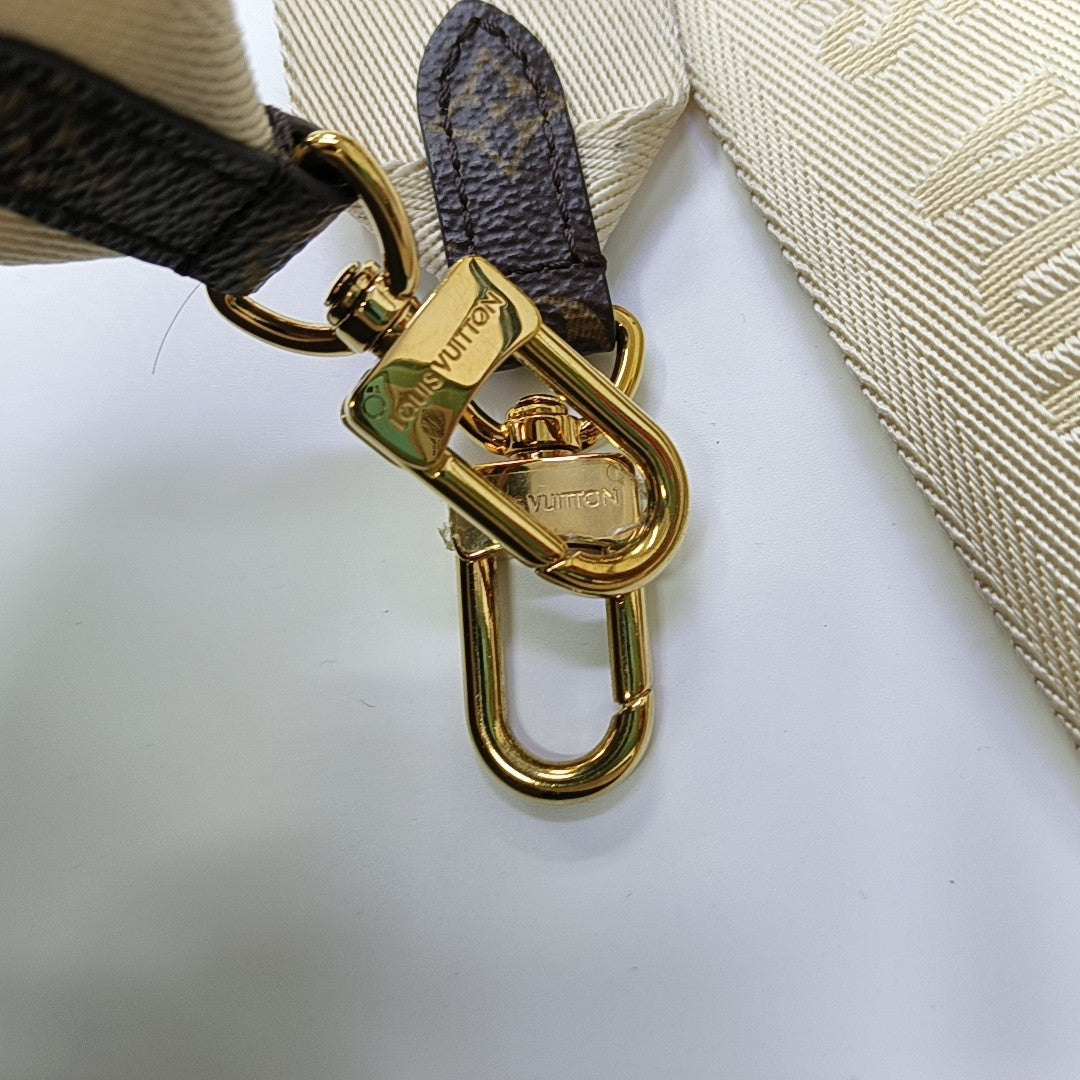 ONTHEGO PM Monogram Coated Canvas Brown