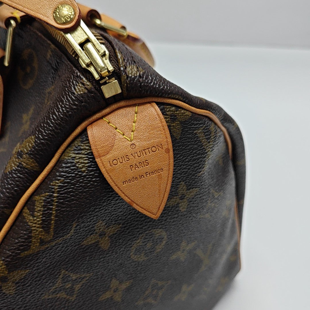 SPEEDY 30 Monogram Coated Canvas Brown