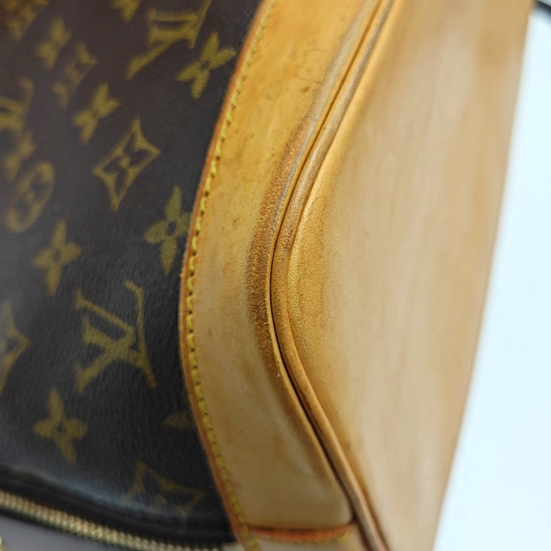 ALMA PM Monogram Coated Canvas Brown