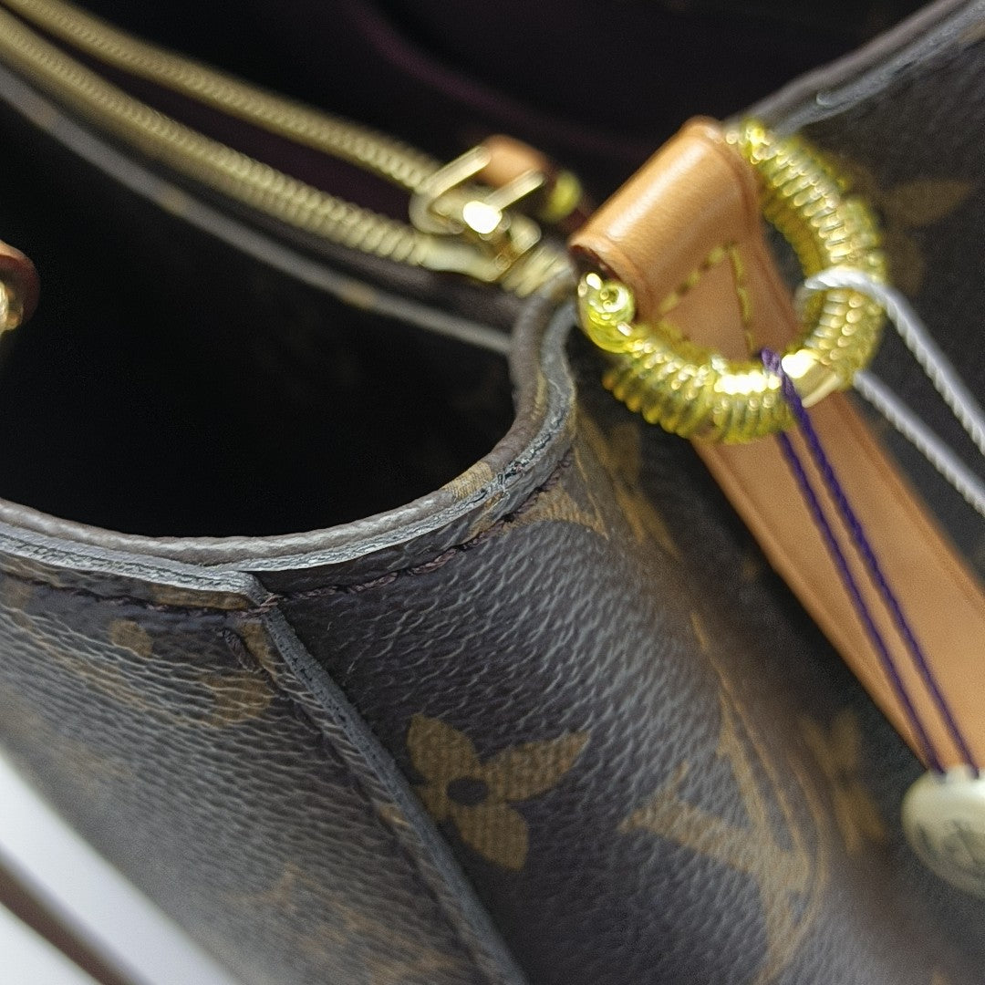 MONTAIGNE Monogram Coated Canvas Brown