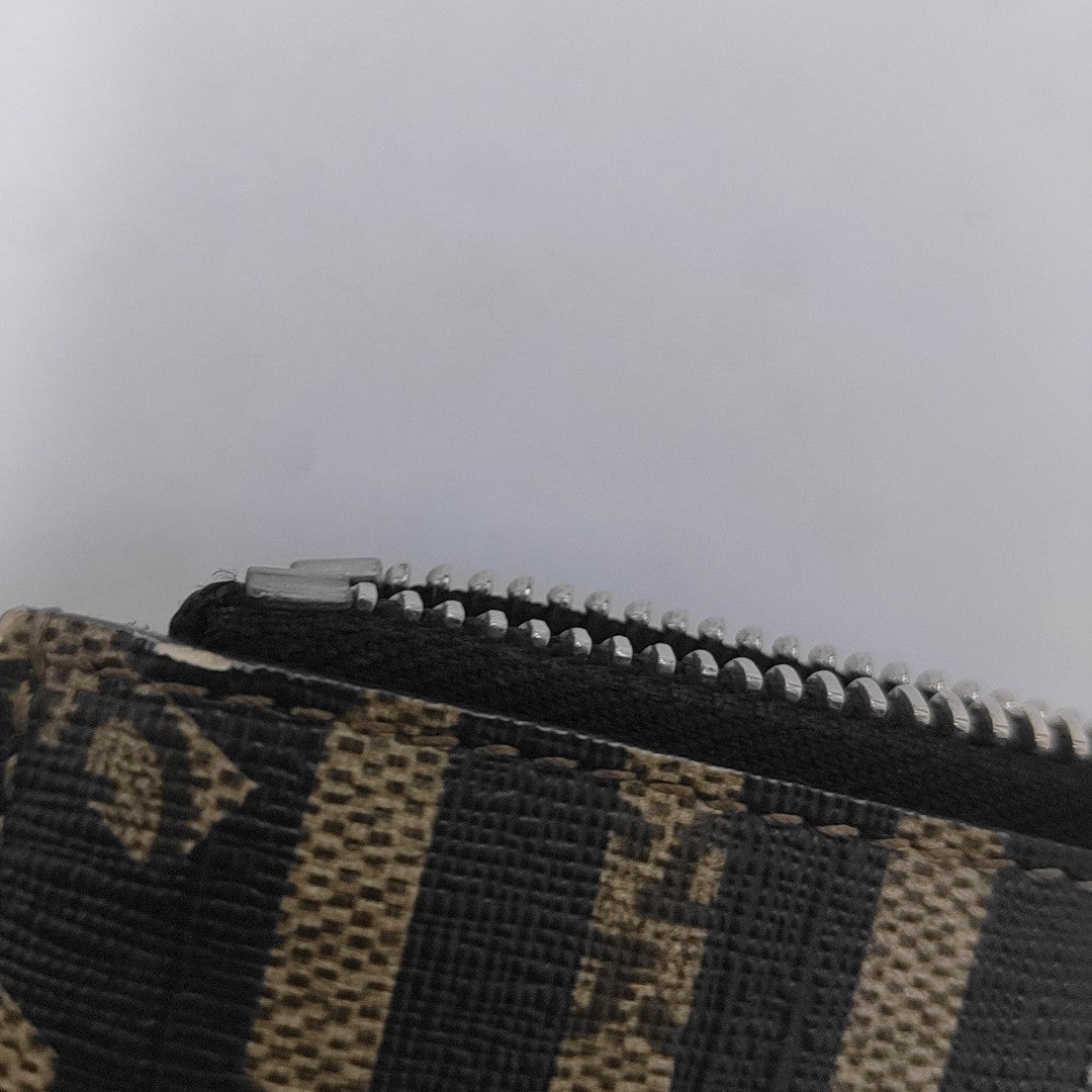 Monogram Coated Canvas Clutch Multicolor