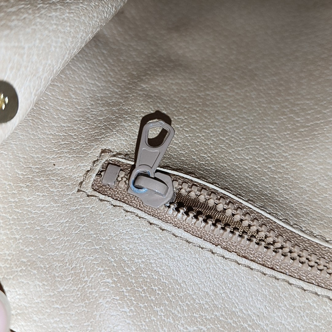 MACADAM CLUTCHE Coated Canvas Beige