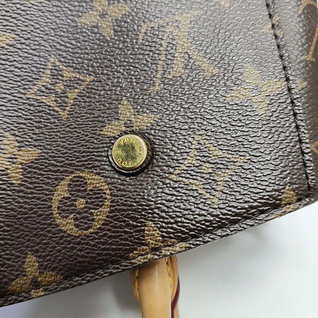 MONTAIGNE Monogram Coated Canvas Brown