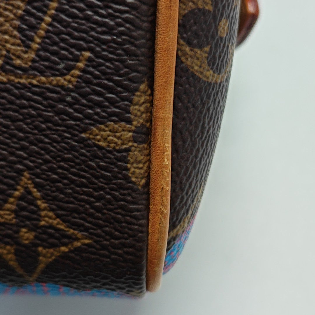 SPEEDY 20 Monogram Coated Canvas Brown