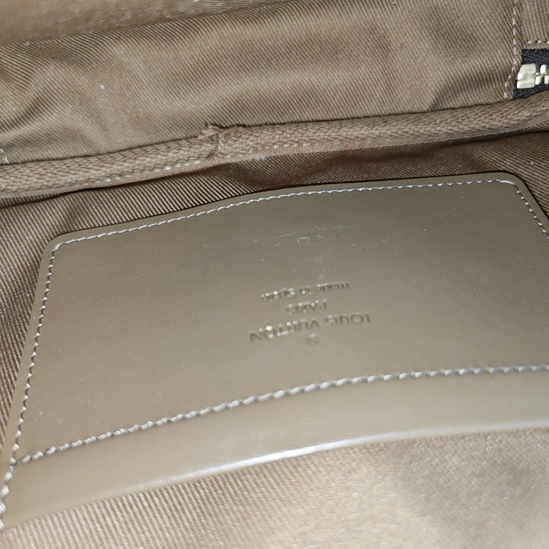 UTILITY Monogram Coated Canvas Brown
