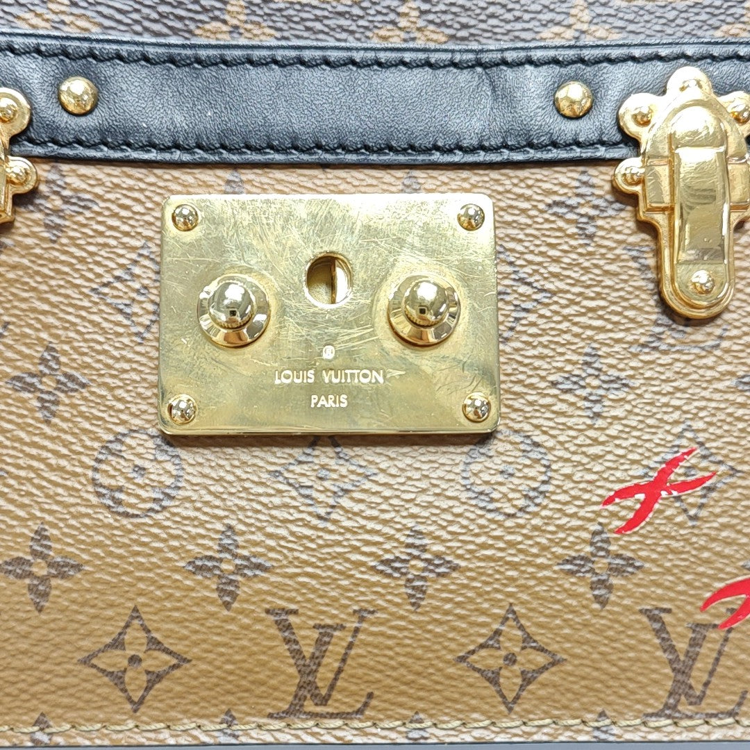 TRUNK Monogram Coated Canvas Brown
