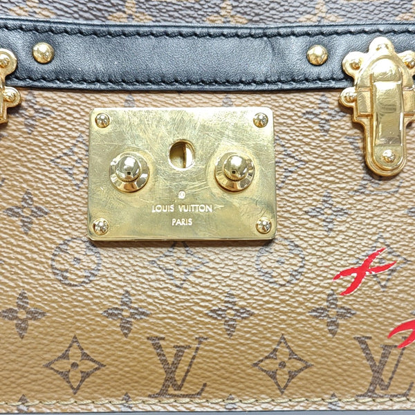TRUNK Monogram Coated Canvas Brown